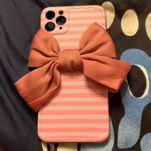 Pink IPhone case with bow
